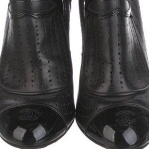 Chanel Authentic actual pic stellar black
booties logo each toe. Size 38. Size 8